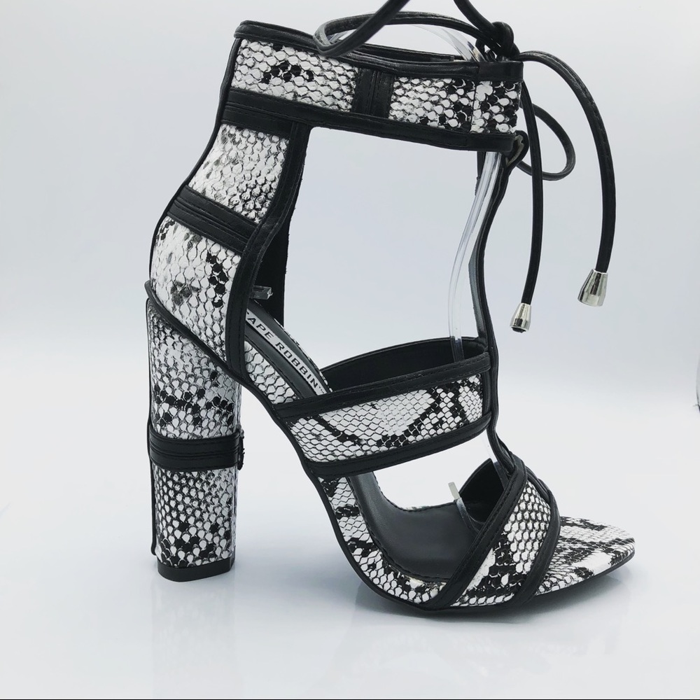 Women’s snakeskin lace-up high heel shoe